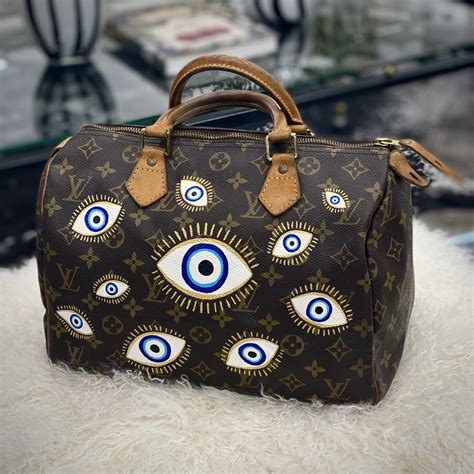 louis vuitton evil eye bag|louis vuitton football club.